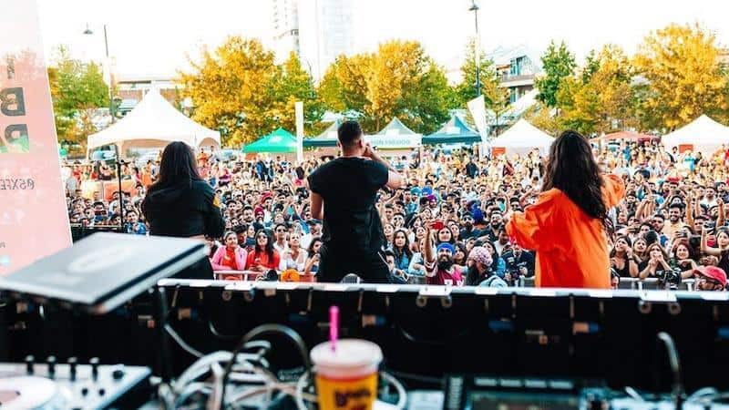BFunk dancing with singer Jaz Dhami at the Surrey Block Party on June 15, 2019. Image via Facebook, used with permission from VIBC.